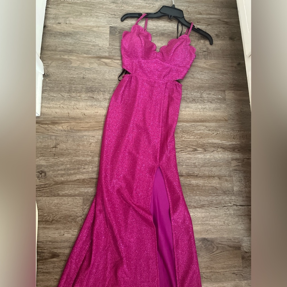Formal pink sparkly dress with slit on the leg and sides. Size 0 from Dillards